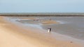 Locals collecting shellfish along the beach